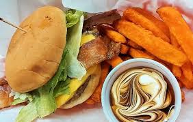Baked sweet potato fries are a healthy alternative to the french fried potatoes that we all love and adore. The Bert Burger With Sweet Potato Fries And A Cinnamon Marshmallow Dipping Sauce Picture Of Triple Xxx Family Restaurant West Lafayette Tripadvisor