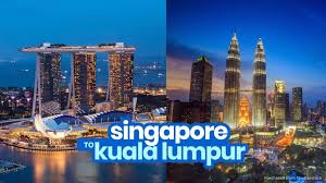 Travel frrom singapore to kuala lumpur by air, bus, taxi, limousine or private transfers. Singapore To Kuala Lumpur By Bus Or Train Crossing The Border The Poor Traveler Itinerary Blog