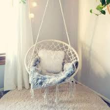 Beautiful woman is meditating sitting in hammock modern studio. The Easy Way To Hang A Hammock Chair Indoors Or Outdoors Yrym Ht