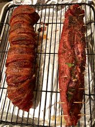 Rub the pork tenderloin with a generous amount of barbecue rub seasoning to flavor the meat. Pork Tenderloin One Is Bacon Wrapped The Other Stuffed With Cream Cheese Spinach And Onion Traeger