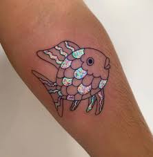 Black light tattoos are created using ultraviolet (uv) reactive ink. The Rainbow Fish Uv Tattoo