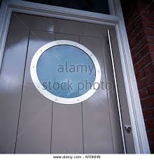 Close Up Of Circular Porthole Window In Modern Grey Front Door Stock Image Doors Interior Modern Porthole Window Timber Front Door