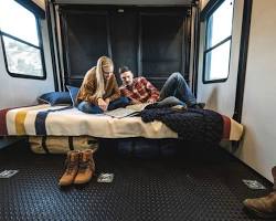 Image of person sleeping comfortably in an RV bed