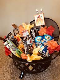 This is a fun twist on the traditional gift basket. Backyard Bonfire Fire Pit For Silent Auction Valentine Gift Baskets Summer Gift Baskets Silent Auction Baskets