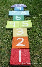 When writing your numbers in each square, make them. Easy Diy Rainbow Paver Hopscotch Happiness Is Homemade