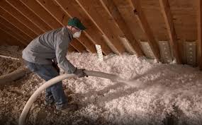 In this case, two installers are needed: Blown In Insulation Knauf Insulation