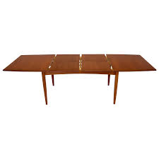 Chrome leg frame in excellent vintage condition. Danish Mid Century Modern Teak Dining Table With Two Pop Up Self Storing Leaves Chairish