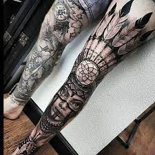 Natural elements like the moon with the tribe and wolves, sunflowers, and others 75 Amazing Native American Tattoos For A Tribal Look