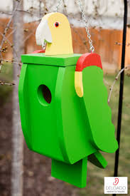 Bird Feeders For Small Birds Amazon This Is A Handmade Quality Birdhouse That Is Made To Look Like A Double Yellow Headed Amazon Parrot It Is Solid Wood In 2020 Bird House Unique Bird Houses Bird Houses
