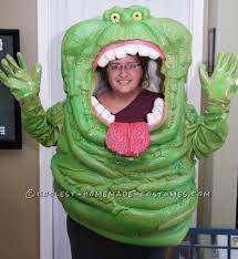 When We Decided That We Were Going To Do Something Somewhat Ordinary Like A Ghostbusters Theme Fo Slimer Costume Ghostbusters Costume Halloween Costume Contest