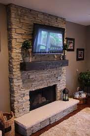 stunning white stacked stone fireplace idea with door and wooden shelf floating t fireplaces home designs kitchen tiles