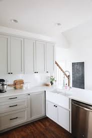 This colorful cooking space by sustainable kitchens is a wonderful example. Kitchen Outstanding White Shaker Cabinets Hardware With Black Layjao