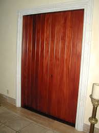 We added a little glue to the flat surface only and used 1″ staples to hold everything in place until we added screws. Custom Made Tongue And Groove Doors By Grateful Woodworks Custommade Com