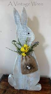 Arrange wooden bowls, serving trays and cutting. Rustic Easter Bunny Wooden Bunny Rustic Spring Decorations Painted Rabbit Prim Spring Decor Easter Wood Crafts Easter Crafts Rustic Spring Decor