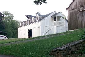 Some post frame homes don't even look like what they're known as. White Barn Black Roof Montana Homes White Barn House Styles