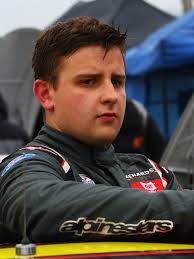 Mahwah NJ resident Joe Graf Jr. climbing auto racing ladder