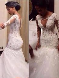 Tulle dresses delight with their versatility of color and style. Trumpet Mermaid V Neck Long Sleeves Floor Length Tulle Wedding Dress With Lace Chicregina