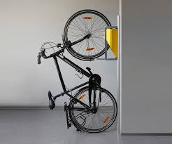 This vertical bicycle lift is designed so that it can be used with the most popular bikes. Vertical Bike Storage Lifts Bike Lift