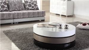 This classic coffee table choice doubles down on the charm with the addition of some adorable feet. Rotatable Creative Round Coffee Table My Aashis