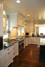 30 Spectacular White Kitchens With Dark Wood Floors Kitchen Remodel Kitchen Remodel Layout Off White Kitchens