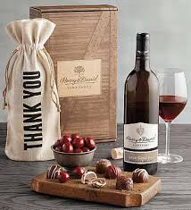 Our dedicated canadian site offers canada's finest flower and gift selections, all priced in canadian dollars and fulfilled we offer perfect gifts handcrafted by skilled florists that will leave a smile on your loved ones faces! Wine Gift Baskets Wine Basket Delivery 1800flowers