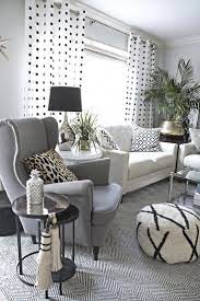 Deeply saturated bright colors like. Neutral And Eclectic Living Room With Lots Of Black And White Accents Diyhomedecorblacka White Living Room Decor Modern White Living Room Eclectic Living Room