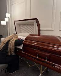 RTN: Erika Kirk, wife of the late Charlie Kirk, shared a video of herself  at his casket, praying and expressing affection. The post offered a  personal glimpse into her mourning and has