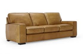Gorgeous dark mahogany brown, with light wooden spindle feet that can be changed. Natuzzi Editions B859 Leather Sofa Set