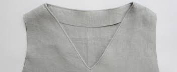 Fortunately, raising a low neckline on a pattern is a really straightforward thing to do. Sewing Glossary How To Sew A Facing To A V Neckline Tutorial The Thread Blog