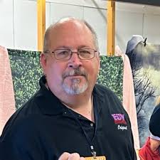 Ellen Fried (@pokerdealinggal)