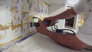 To install a new backsplash, it's first necessary to remove the old one from the kitchen walls. How To Install Glass Mosaic Tile Backsplash Part 1 Prepping The Walls Youtube