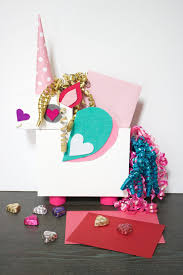 For the head, you're going to assemble one side of the box that has the v cutouts. Unicorn Valentine Card Holder Craft Box Girls