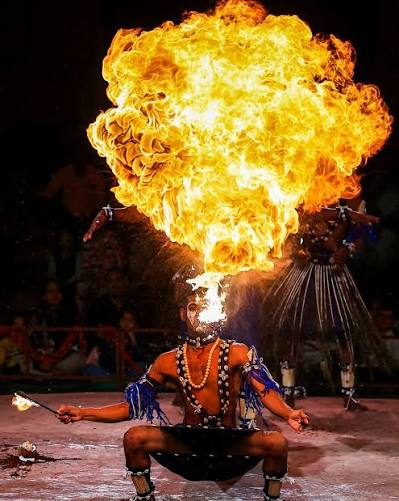 Members of the Gujarati Siddi tribe perform during a 'Siddi Dhamal' performance at Lok Rang 2025, in Jaipur