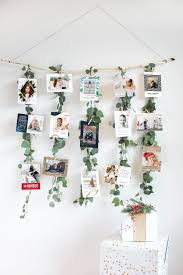 To try this fresh way to show off holiday cards, wrap a straw wreath form with upholstery webbing (available at fabrics stores), securing it in place with small, concealed sewing pins. Christmas Card Displays How To Display Your Holiday Cards