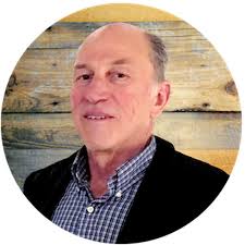 Billionaire found dead in private lake north of Spokane