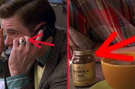 In the truman show, truman's wedding ring is comically oversized with a black diamond, indicating that it's one of the show's many hidden cameras. 12 Little Details In The Truman Show That Deserve A Round Of Applause
