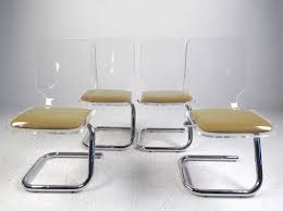 Wonderful mid century style chair on chrome platform base. Mid Century Modern Lucite And Chrome Dining Chairs By Luigi Bardini For Sale At 1stdibs