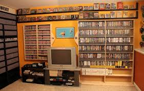 Decorating a game room can be tricky — you want it to feel fun and relaxed but the effect: Mother Of Retro Gaming Retro Games Room Video Game Rooms Game Room Furniture