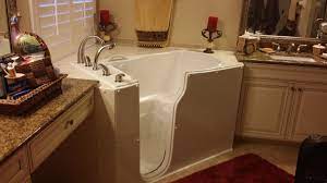 With an assistant, tip up one side of the bathtub to remove it. Theratub Walk In Bathtub Installed Replacing A Corner For Garden Tub Www Theratub Com Walk In Bathtub Walk In Tubs Bathrooms Remodel