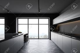 Chic dining room design with gray walls paint color, coffered ceiling glazed kitchen cabinets, white cabinets with dark wood floors. Side View Of Stylish Kitchen With Grey Walls Dark Wooden Floor Stock Photo Picture And Royalty Free Image Image 141446073