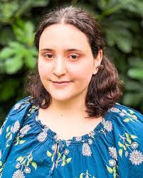 We unveiled our new visual identity today, celebrating by giving away new  hats, T-shirts, pens, and stickers along with donuts and coffee. They  disappeared fast! But this new look was built to