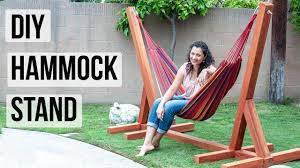 This Diy Hammock Stand Is Easy To Build Using 4x4 Wood With Full Instructions Video Tutorial And Plans Hammock Stand Hammock Chair Stand Diy Hammock Stand Diy