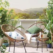 Fresno Chair Natural Bring The Warmth Of Acapulco Style To Your Home Synthetic Rope Cord Handwoven Over A Steel Pow Urban Barn Outdoor Outdoor Furniture Sets