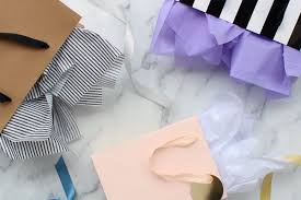 Medium bags might use 2 to 3 pieces of tissue for cushioning on the bottom and sides, plus 2 pieces to poof out the top. How To Put Tissue Paper In A Gift Bag Paper Mart Blog