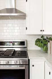 The oil rubbed bronze finish is a chemically darkened surface designed to simulate aged bronze. White Kitchen Cabinets With Vintage Oil Rubbed Bronze Hinges Cottage Kitchen