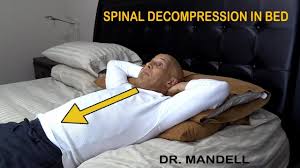 Spinal Decompression In Bed Discovered By Dr Alan Mandell Dc Youtube Spinal Decompression Spinal Neck And Shoulder Exercises