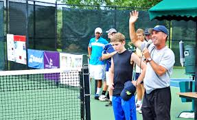 Event Manager Andy Zodin announces a winner (Photo by Erik Morin)