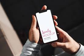 Download Mockup Of A Man Holding An Iphone 11 With Both Hands Iphone 11 Promotional Image Iphone