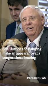West Virginia Sen. Jim Justice and Babydog send a message of unity at a  Department of Energy hearing.