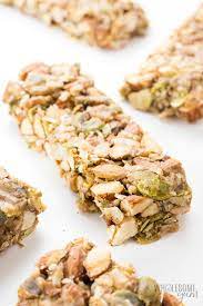 Some granola bar recipes employ a method similar to the one used to make rice krispie bars, where you make a syrup, pour it over oatmeal and you mix the dry ingredients, mix the wet ingredients, combine them, spread them into a pan, and bake them. Best Sugar Free Keto Low Carb Granola Bars Recipe Wholesome Yum
